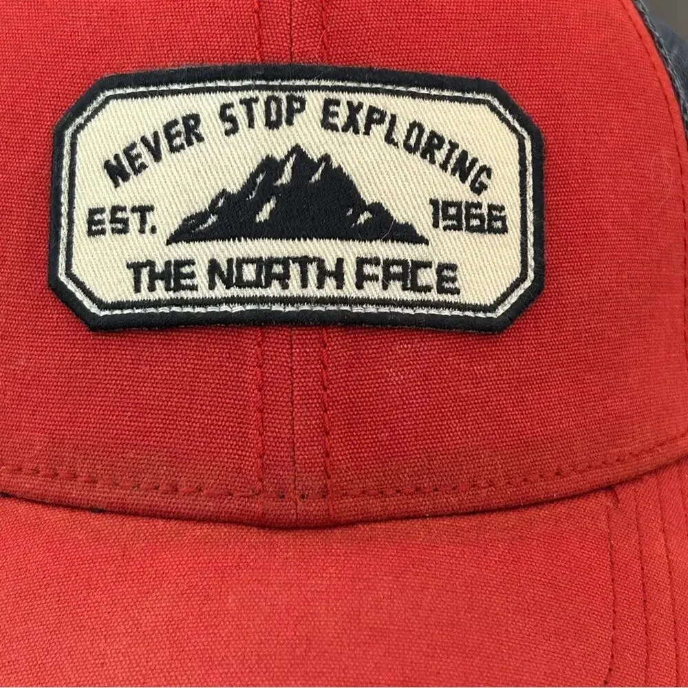 The North Face Patches Trucker Hat Never Stop Exploring Red Navy One Size